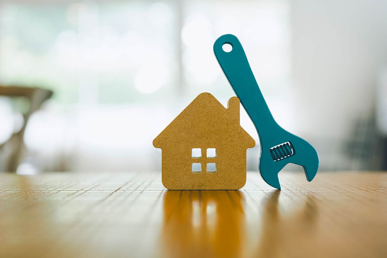 Model house and wrench, home services