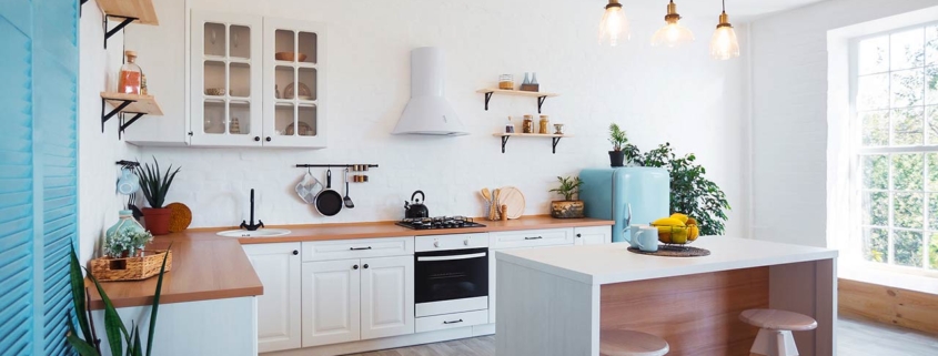 modern kitchen interior with island, sink, cabinets, and big window in new luxury home